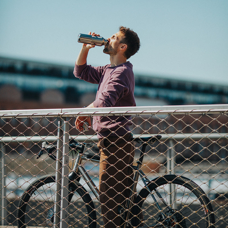 20oz-rise-reflect-with-bamboo-cap-q8 16oz_rise_reflect_man_bike_square.jpg