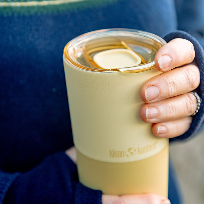 daily-on-the-go-set-s7 16oz_rise_tumbler_wax_yellow_closeup_hand_lid_square.jpg