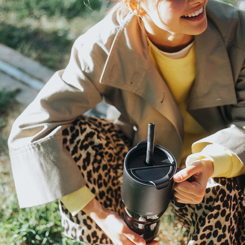 26oz-rise-tumbler-with-straw-lid-x1 26oz_rise_tumbler_black_woman_topview_square.jpg