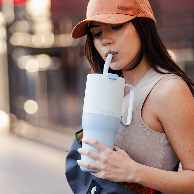36oz-rise-tumbler-with-straw-lid-u7 36oz_rise_tumbler_straw_girl_sip_square.jpg