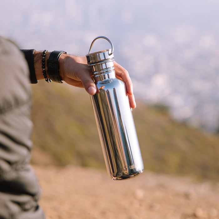 27oz-reflect-with-bamboo-cap-y3 K27SSLRF-MS-BAMBOO_reflect_bottle_hand_lifestyle.jpg