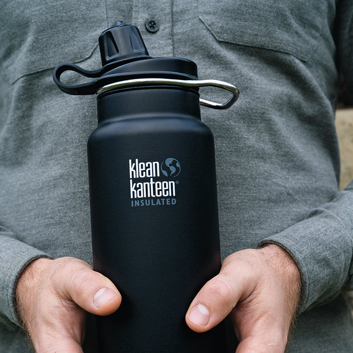 tkwide-chug-cap-q9 K32TKWSSL-SB-Craddled-Bottle_closeup_lifestyle.jpg