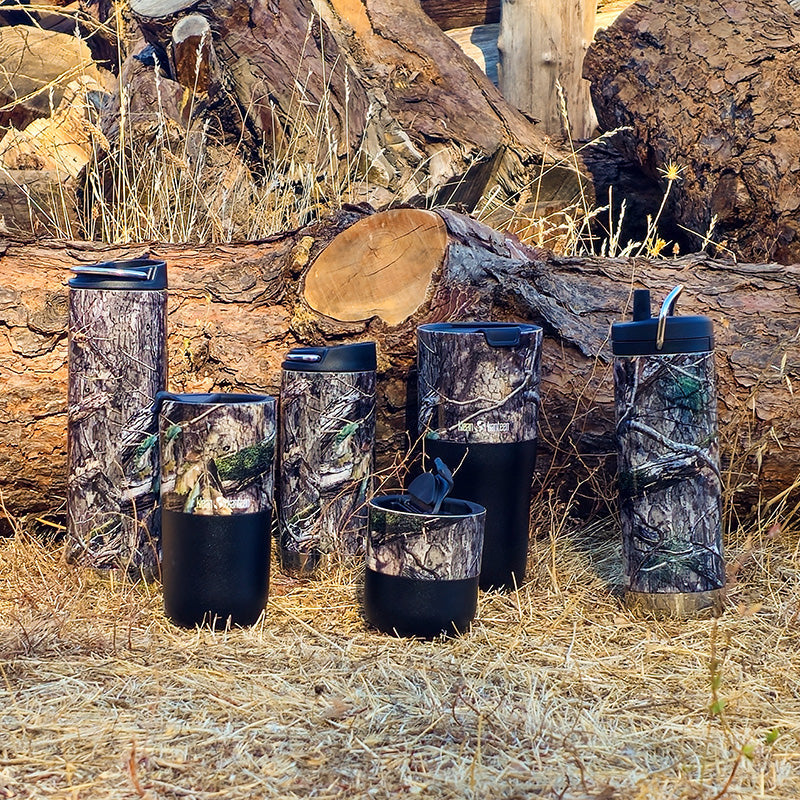 16oz-tkwide-with-cafe-cap-mossy-oak-x8 MossyOak_CountryDNA_collection_grass_logs_square.jpg